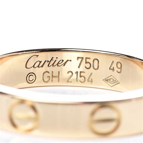 cartier 18k gold wedding ring.